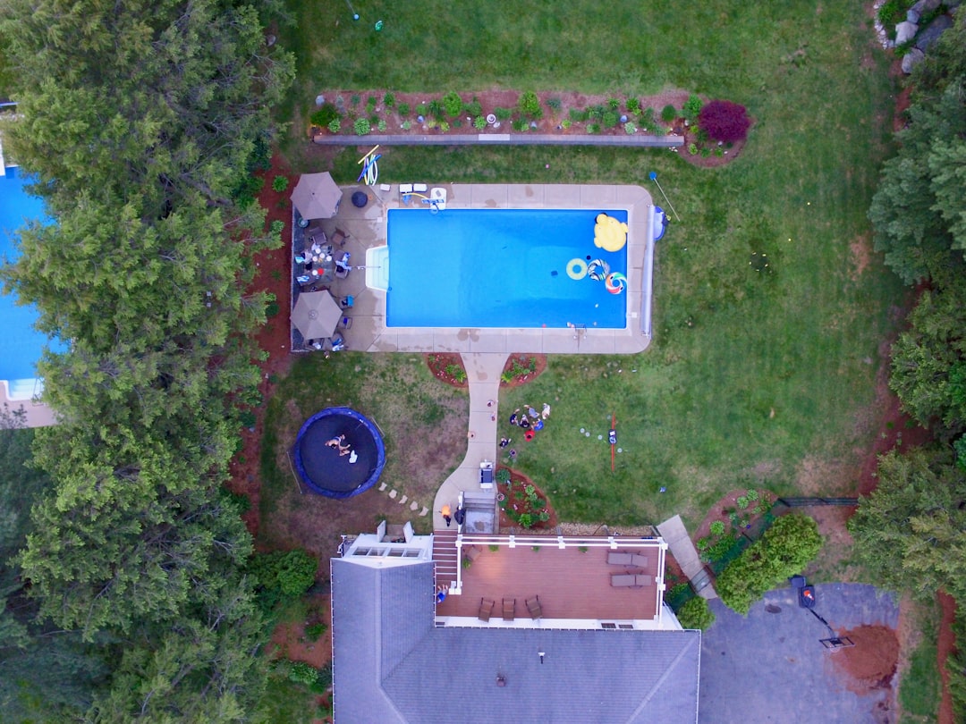 Aerial view of house with swimming pool